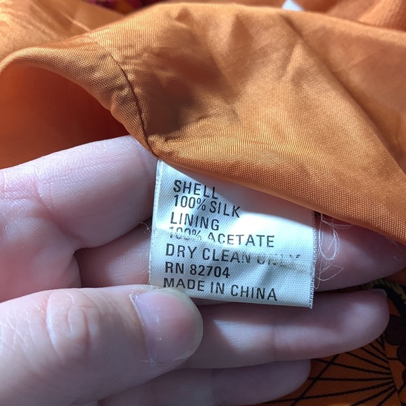 Anne Pinkerton | Travel Map Sleeveless Button Down Vest | burnt orange - Picture 12 of 13